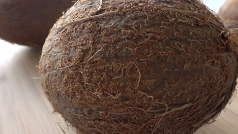 Coconut-close-up-on-Wooden-background