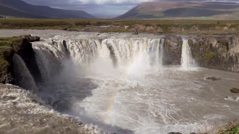 Breathtaking-view-of-the-Godafoss-waterfall-with-rainbow---Northern-Iceland