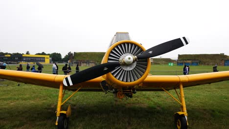 Old-Zlin-Z-37-Cmelak-agricultural-aircraft-parked-on-grass-field-during-airshow