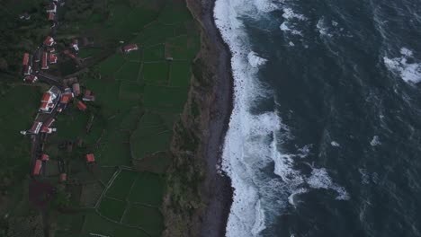 Fly-above-Atlantic-ocean-near-flores-island-Azores-with-rough-sea,-aerial