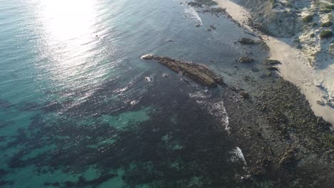 reef-and-beach-frome-above-by-drone,-punta-paloma-in-tarifa,-spain