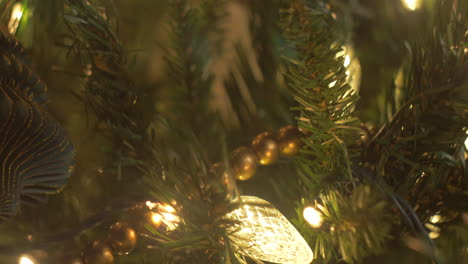Christmas-tree-ornaments-and-lights-in-a-close-up,-bokeh,-slider-move,-trendy-decorations,-right-to-left