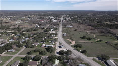 Aerial-Shot-over-Johnson-City,-Texas-and-Hill-Country-near-highway-290