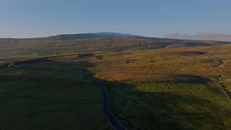 Wide-Angle-Drone-Shot-of-Ribblehead-Viaduct-and-Snowy-Whernside-Sunset