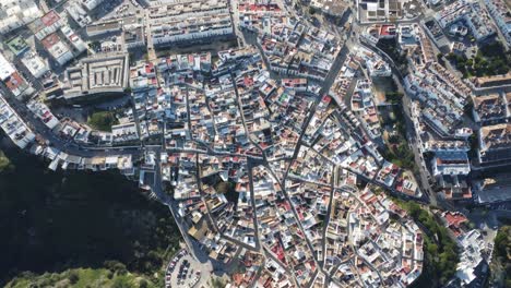 drone-flies-over-the-city-of-vejer-de-la-frontera-in-andalusia,-nice-sunny-weather