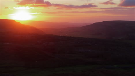 Establishing-Drone-Shot-of-Yorkshire-Dales-into-the-Sun-at-Sunset-UK