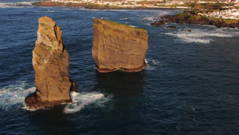 Drone-shot-of-the-majestic-rock-formations-located-near-Mosteiros-beach-on-the-island-of-Sao-Miguel