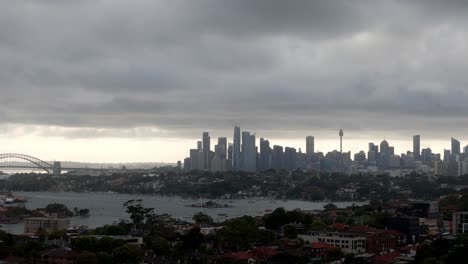 Overcast-Skyline-View-of-a-Metropolitan-City-with-Iconic-Bridge-and-Tower:-A-Blend-of-Urban-Architecture-and-Gloomy-Weather