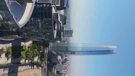 Aerial-View-Of-Costanera-Center-And-Titanium-La-Portada-Towers-In-Santiago-On-Sunny-Day