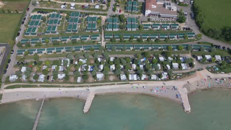 Aerial-Top-Down-View-of-Camping-Lido-Lazise-and-Shore-of-Lake-Garda,-Italy