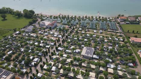 Aerial-Shot-Over-Camping-Lido-Lazise-and-Lake-Garda-in-Italy