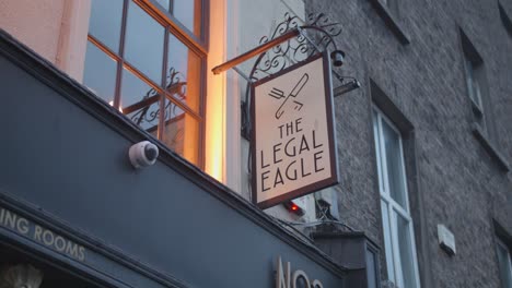 Close-up-of-sign-on-the-access-facade-of-The-Legal-Eagle-Pub-in-Dublin,-Ireland