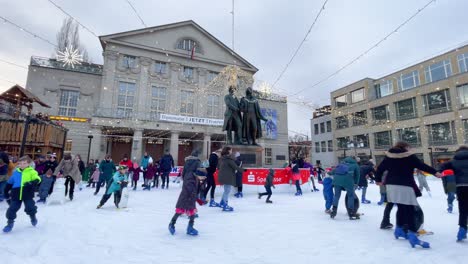 People-Ice-Skating-at-Goethe-and-Schiller-Monument-in-Festive-Weimar