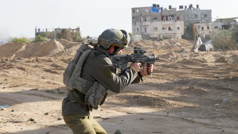 A-Golani-Brigade-soldier-aims-at-a-target-then-fires-Tar21-rifle-before-kneeling