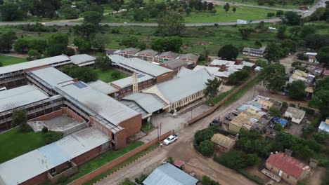 Drone-video-of-a-catholic-mission-school-campus-at-a-high-density-suburb-township-in-Bulawayo,-Zimbabwe