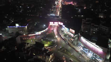 Rajkot-aerial-drone-view-Many-vehicles-are-moving-around-the-square-and-many-vehicles-are-coming