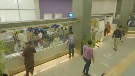 Drone-shot-of-employees-and-clients-in-a-busy-office-of-Pakistan