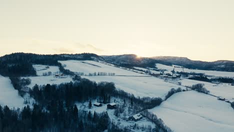 Snowscape-Over-Mountain-Farm-Village-During-Sunrise-In-Indre-Fosen,-Norway