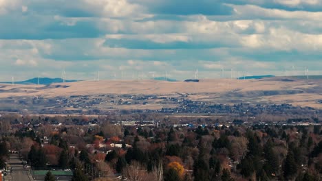 Drone-shot-in-Idaho-Falls-of-many-wind-mills-in-the-distance