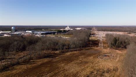 An-aerial-view-of-the-BAPS-Shri-Swaminarayan-Mandir-in-Robbinsville-Twp,-NJ-on-a-sunny-day-while,-it-was-closed-for-the-day