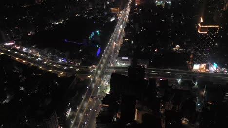 rajkot-aerial-drone-view-A-big-bridge-is-visible-in-the-middle-and-many-vehicles-are-going-over-the-bridge