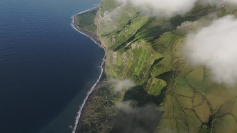 Panoramic-view-of-rough-coastline-at-Fajã-de-Lopo-Vaz-Azores---drone-shot