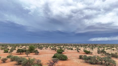 Aerial-panning-shot-of-storm-clouds-building-in-the-Southern-Kalahari