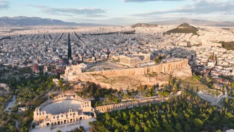 Flying-around-the-Acropolis-of-Athens,-Greece-on-a-day-with-sunshine