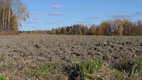 Plowed-field-soil-in-autumn-after-harvest-in-countryside