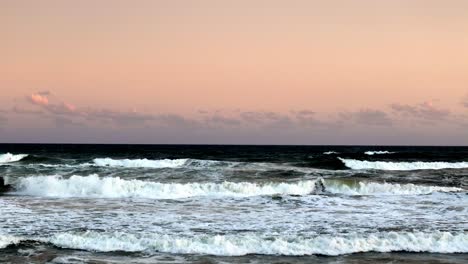 Pastel-Dawn-Skies-Above-Foamy-Ocean-Surf:-The-Quietude-of-Nature-at-Daybreak