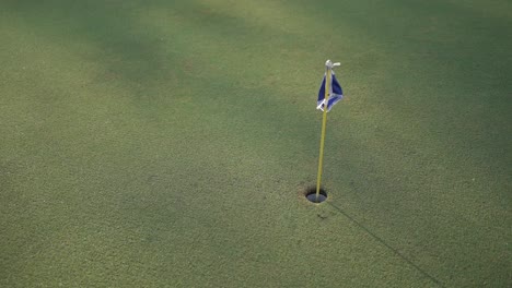 Smooth-movement-of-golf-ball-hole-and-flag