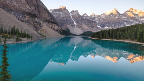 Sunrise-time-lapse-at-clear,-pristine-alpine-lake-in-the-Canadian-Rockies