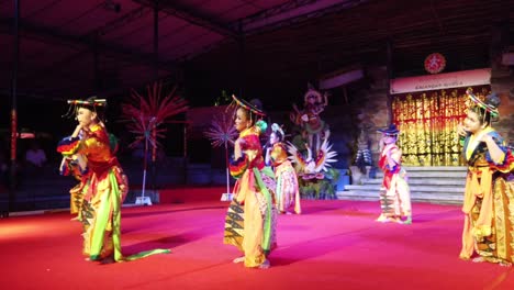 Colorful-Dressed-Female-Artists-Perform-Yapong,-Indonesian-Dance-at-Art-Festival