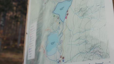 A-hiker-shows-a-trail-on-a-map