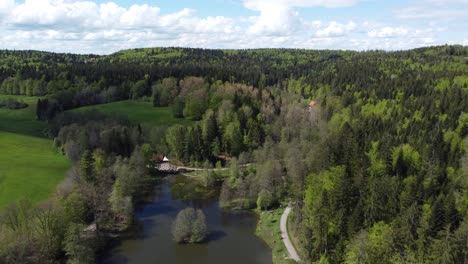 Aerial-view-of-popular-swimming-lake-Ebnisee-in-the-Swabian-Franconian-forest