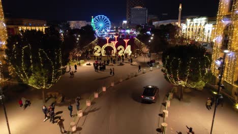 Tirana's-Center-adorned-with-vibrant-lights-shines-brightly-for-the-New-Year-celebrations,-creating-a-festive-and-colorful-spectacle