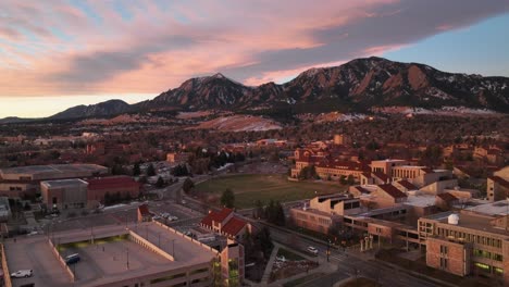 Aerial-Drone-Timelapse-of-sunrise-at-the-University-of-Colorado-Boulder-collage-campus-on-a-dramatic-winter-morning