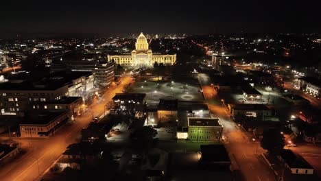Arkansas-State-Capitol-building-at-night-in-Little-Rock,-Arkansas-with-drone-video-moving-in-a-circle-close-up