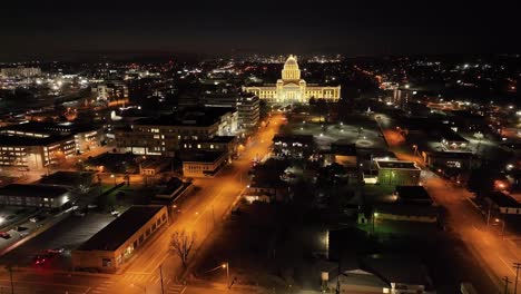 Arkansas-State-Capitol-building-at-night-in-Little-Rock,-Arkansas-with-drone-video-wide-shot-stable-at-an-angle