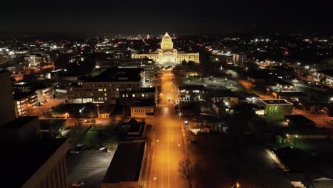 Arkansas-State-Capitol-building-at-night-in-Little-Rock,-Arkansas-with-drone-video-moving-forward
