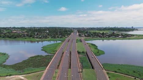 An-aerial-shot-of-the-Zaiman-highway-bridge-in-Misiones,-Argentina