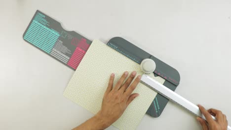Making-crafts-using-patterned-paper-with-ruler-and-punch-board-tool