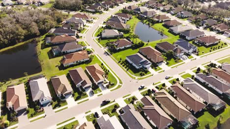 Aerial-of-a-sunny-suburban-neighborhood-in-tropical-climate
