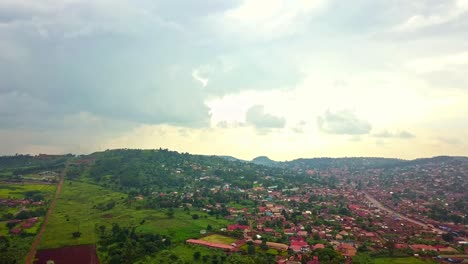 Aerial-View-Of-Residential-Town-Of-Njeru-At-Sunset-In-Buikwe-District,-Uganda