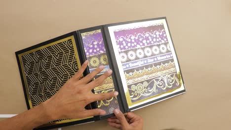 Decorating-cover-of-lever-arch-file-binder-with-ornate-foil-papers