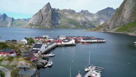 Hamnoy-Village,-Harbour-and-Fjords-in-Lofoten-Islands,-Norway---Aerial-4k