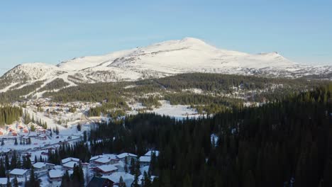 Drone-aerial-view-Åre,-Sweden-during-sunset