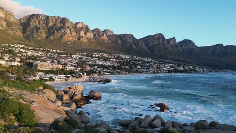 Dive-into-the-beauty-of-Camps-Bay,-South-Africa,-with-stunning-drone-footage-over-the-Atlantic