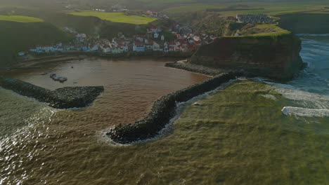 High-Establishing-Drone-Shot-of-Staithes-Coastal-Village-North-Yorkshire