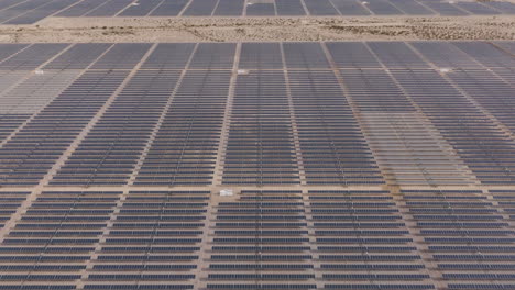 Solar-Farms-in-a-Desert,-Aerial-Panorama-Flyover